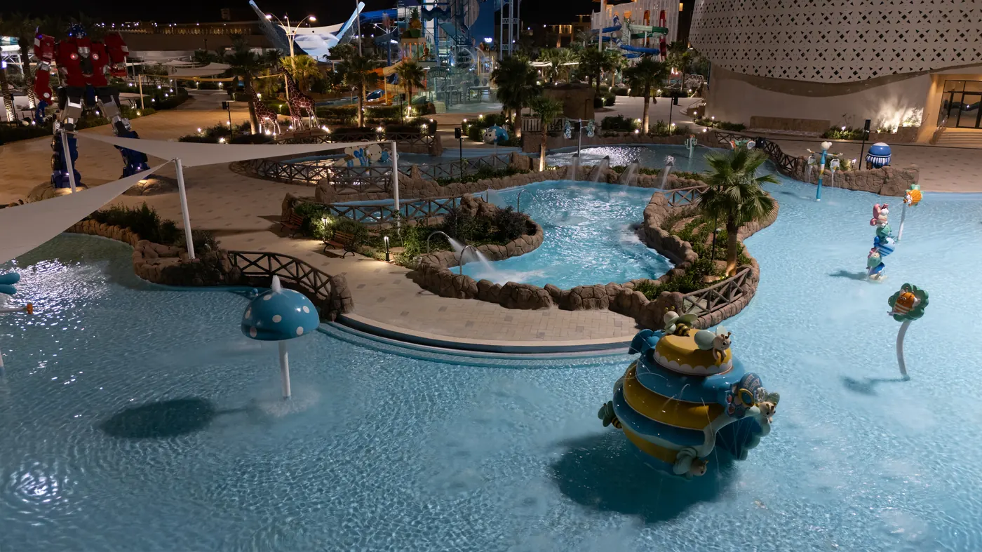 Cala Water Park visitor setting around the dining outlets